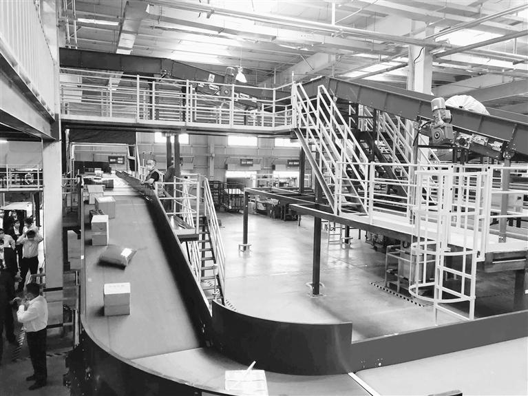 甘肅郵政智能化郵件處理中心在蘭州新區投產 日均處理可達60萬袋（件）