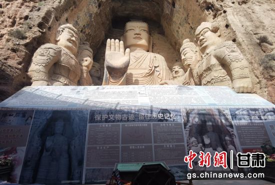 時(shí)下，中國(guó)“石窟鼻祖”天梯山石窟第13窟大佛足部與局部危巖體搶救性保護(hù)項(xiàng)目正在施工。圖為施工現(xiàn)場(chǎng)。陳曉斌 攝